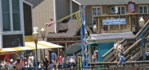 Side view of girl on Frequent Flyers bungee ride