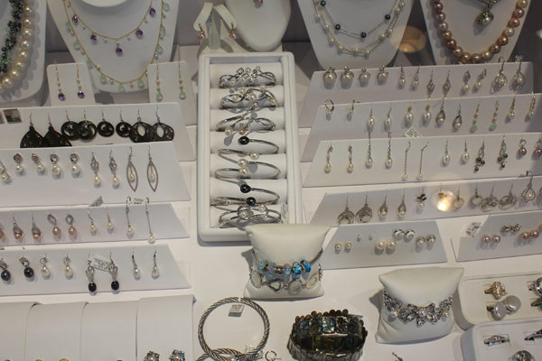 Rows of jewelry on display at Pearl Factory